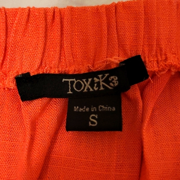Toxik3 Salmon Colored Romper with Accent Buttons - Picture 3 of 5